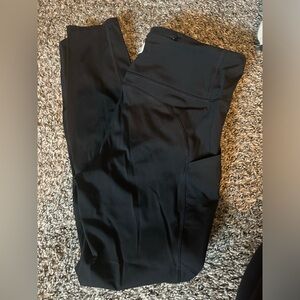 Vuori Stride Legging Women's Performance Legging Black Size L Pockets Yoga Gym